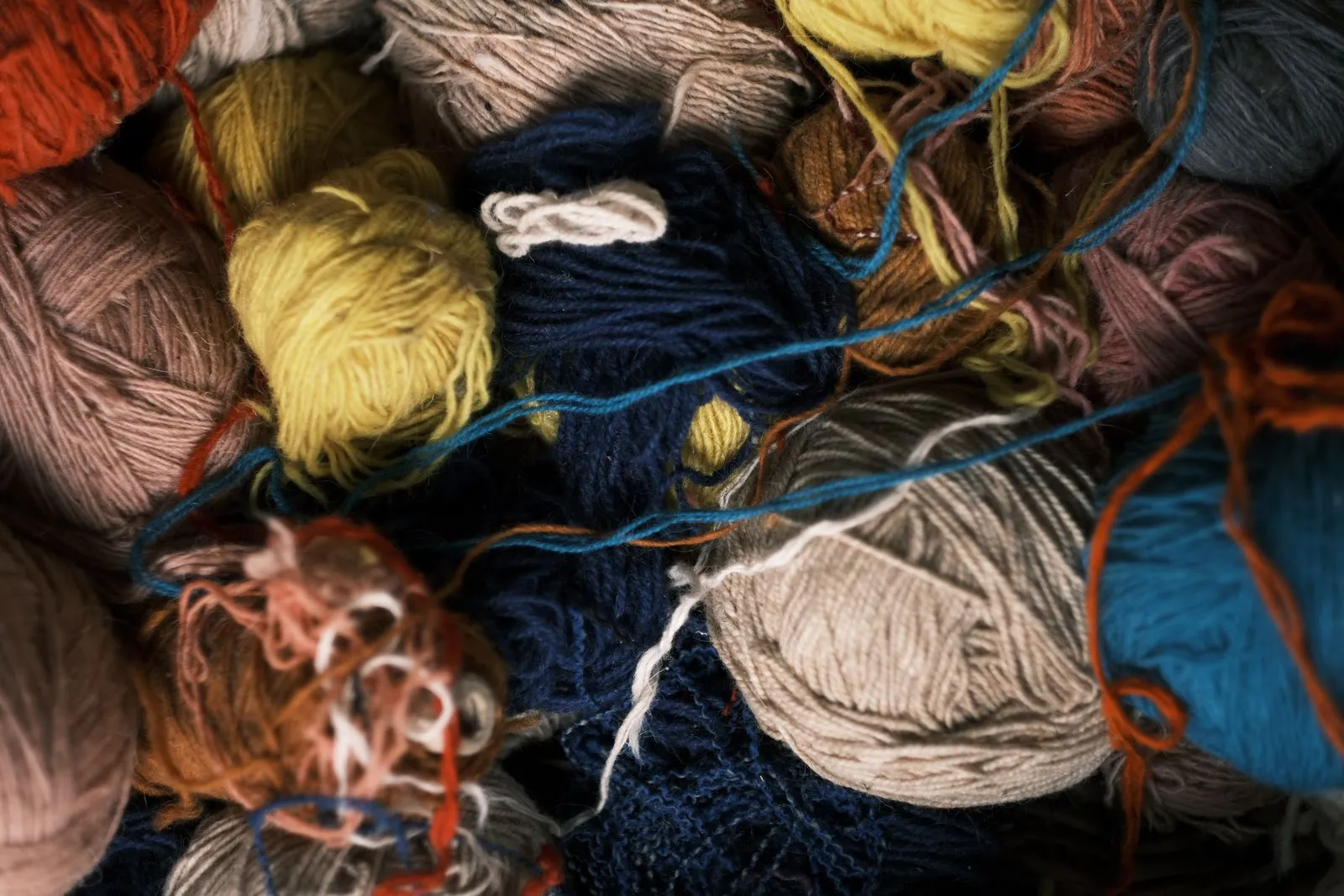 A vibrant close-up of colorful yarn balls, perfect for knitting and crafting inspiration.